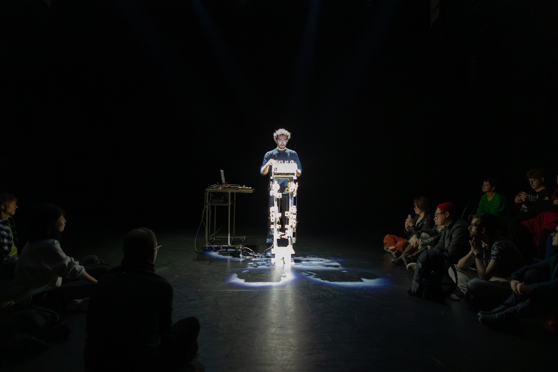 Audience surrounding a Misfit Harp performance at Korzo