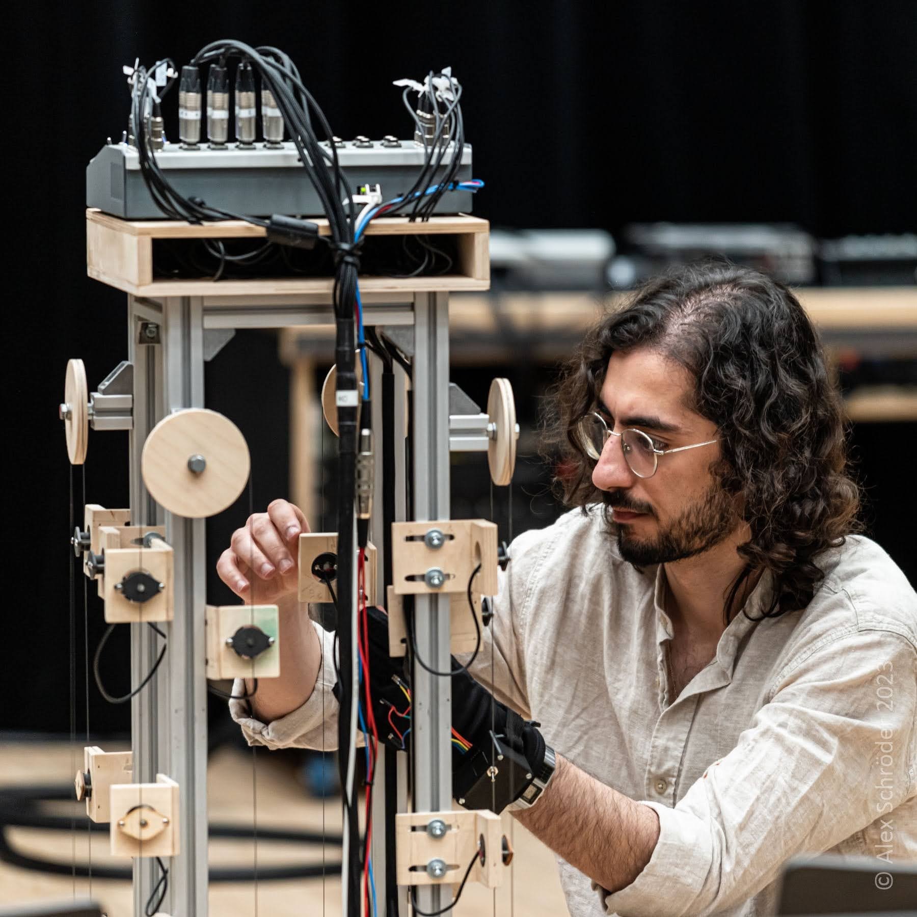 Siavash Jafari adjusting the Misfit Harp